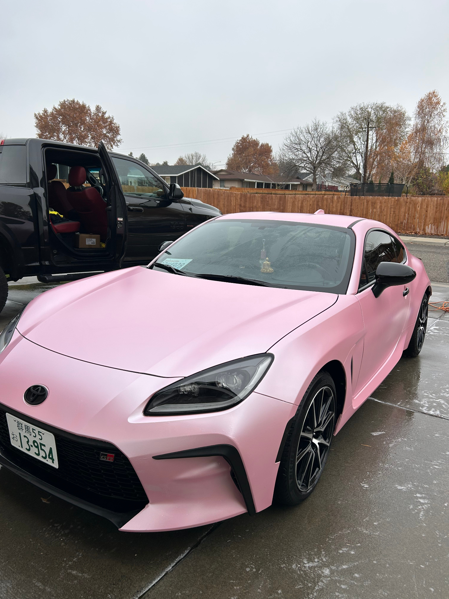 Pink Toyota GR86 sports car detailing Kennewick WA - custom wrap protection and shine