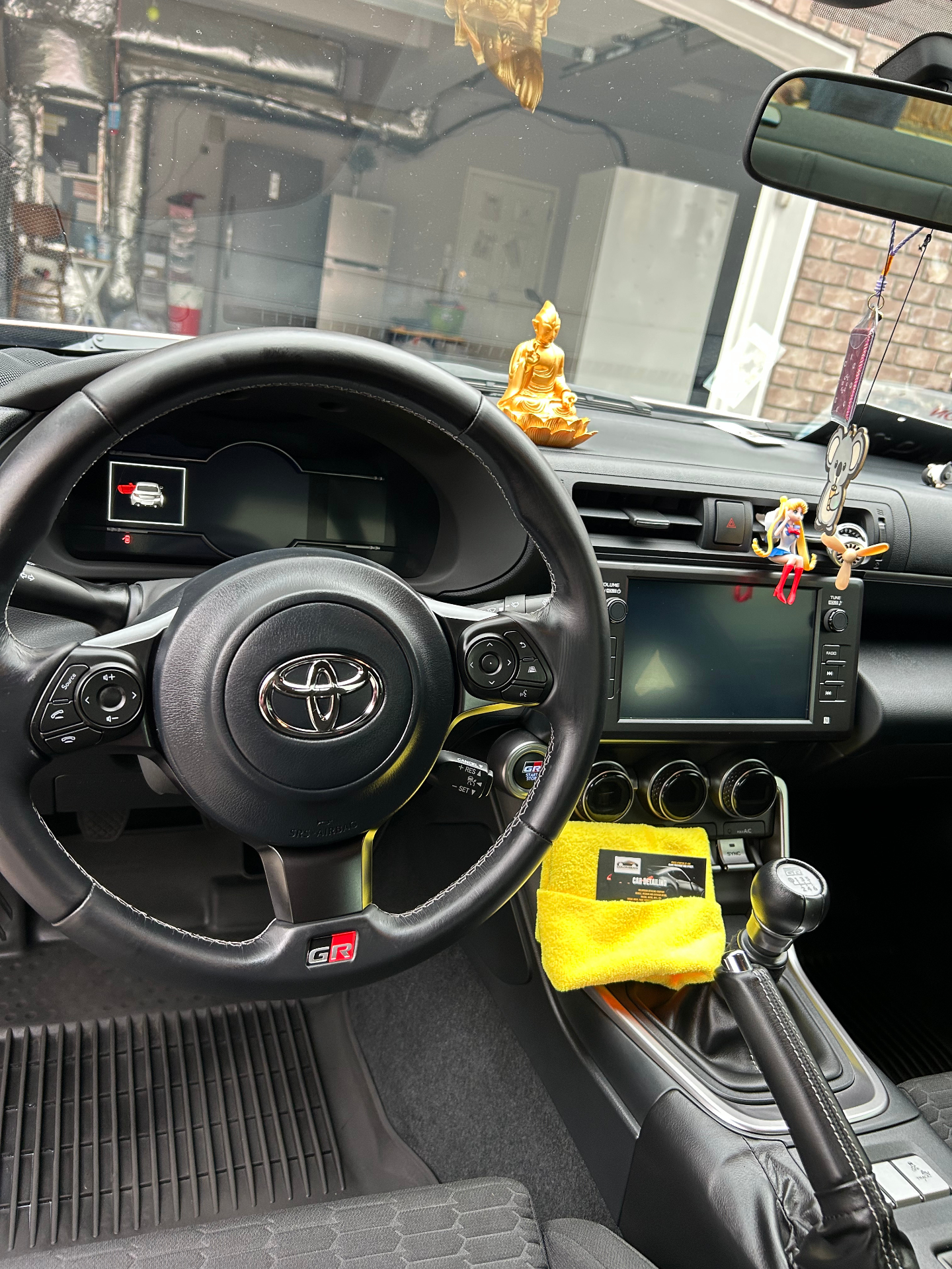 Toyota GR86 sports car interior cleaning Tri-Cities WA - detailed dashboard and steering wheel